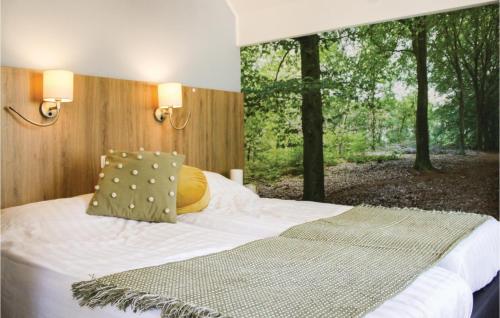 Una cama o camas en una habitación de Houtduif