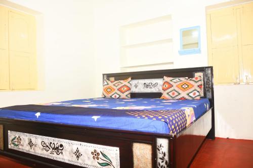 Postel nebo postele na pokoji v ubytování Hotel R homestay
