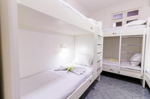 Katil atau katil-katil dalam bilik di AFS LOFT HOSTEL Aracaju