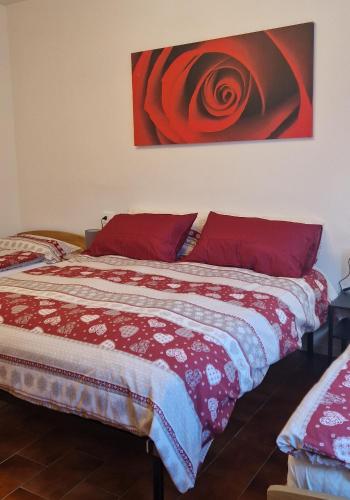Ένα ή περισσότερα κρεβάτια σε δωμάτιο στο I Sei Petali Apartment