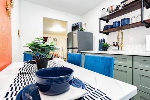 a kitchen with a table with a bowl on it at Star Motel Unit 4- Premier Downtown Hotel Luxury 1br Private Oasis in Las Vegas