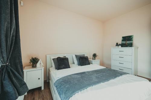 Katil atau katil-katil dalam bilik di Baltica Heaven by 2HomeRent
