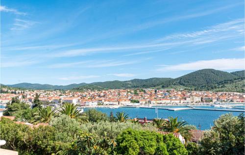 a view of a city with a harbor at Cozy Apartment In Vela Luka in Vela Luka