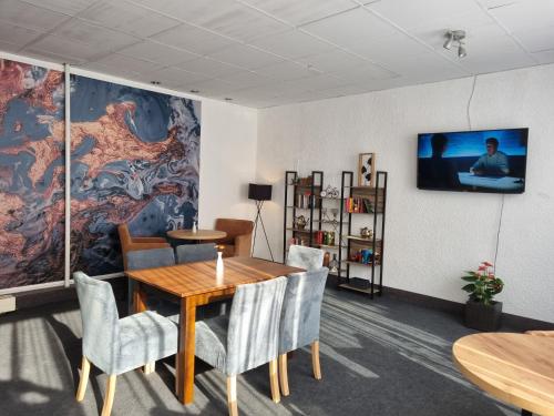TV a/nebo společenská místnost v ubytování Hotel Milin