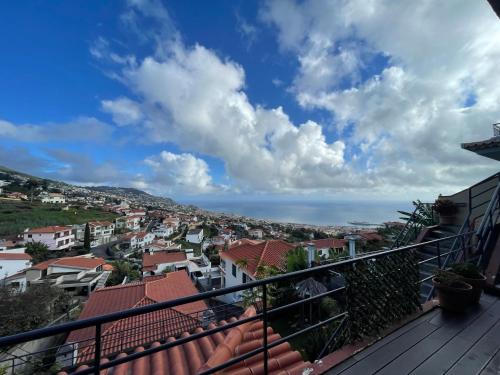 a view of the city from the balcony at Camacho Residence in Funchal