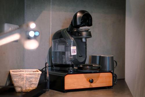 a coffee maker sitting on top of a table at Ferienwohnung Schlossblick in Neuwied