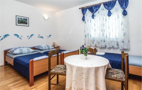 Posteľ alebo postele v izbe v ubytovaní Holiday Apartment Omis 07