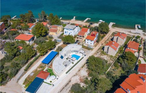 an aerial view of a house with red roofs at Feriatum Lissa in Zadar