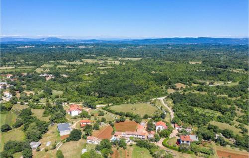 an aerial view of a house in a forest at Villa Ivka in Pula