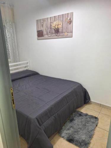 Ένα ή περισσότερα κρεβάτια σε δωμάτιο στο Piccola Stella