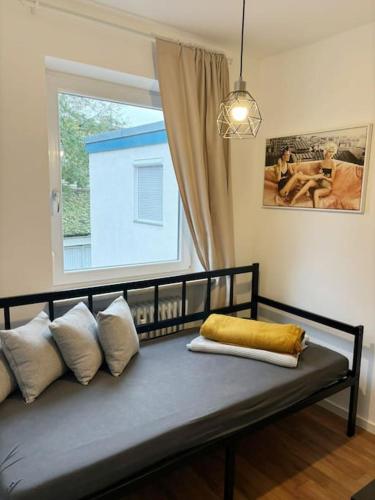 Ένα ή περισσότερα κρεβάτια σε δωμάτιο στο Zentrum - am Dom - Wohnung