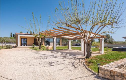 a building with a tree in front of it at Lovely Home In Rovinj in Rovinj