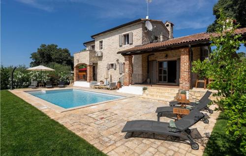 an external view of a house with a swimming pool at Villa Maria Selina in Selina