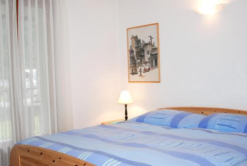 Postel nebo postele na pokoji v ubytování Casa Fontanella