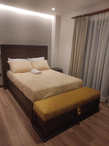 Ein Bett oder Betten in einem Zimmer der Unterkunft GZ GUEST HOUSE