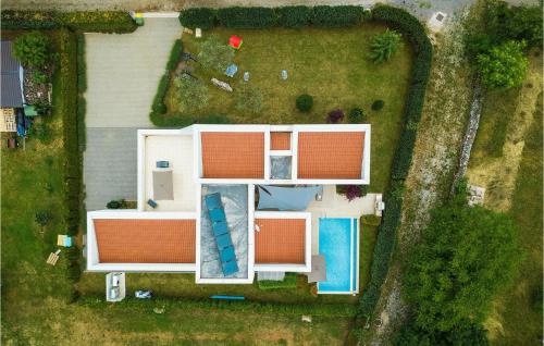 an aerial view of a house with orange roofs at Villa Kate in Žminj