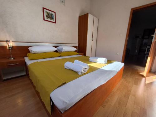 Katil atau katil-katil dalam bilik di Astramaris Apartments