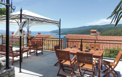 Nice Apartment In Rabac With House Sea View