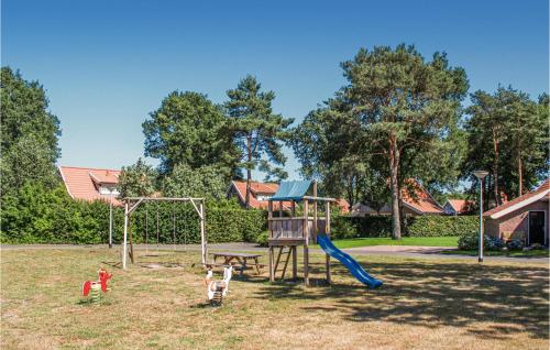 a park with a playground with a slide at Beautiful Home In Hoge Hexel With Wifi in Hoge-Hexel