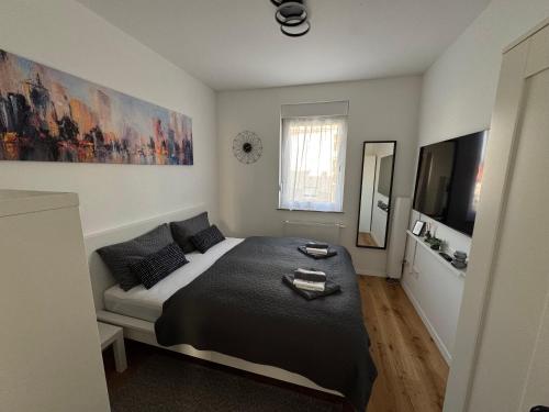 Ένα ή περισσότερα κρεβάτια σε δωμάτιο στο Apartment B Arena Zagreb