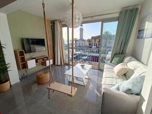 Televízia a/alebo spoločenská miestnosť v ubytovaní SUPERBE APT VUE MER- 6 pers- HYPER CENTRE