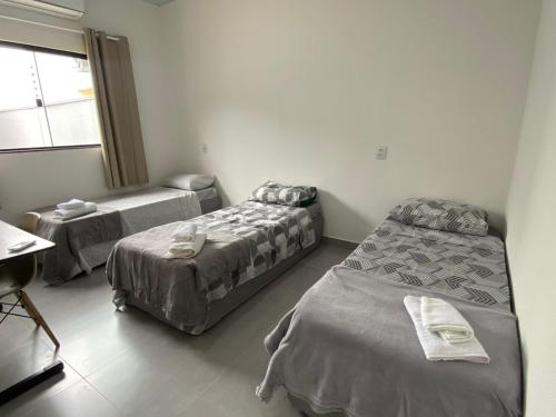 Ένα ή περισσότερα κρεβάτια σε δωμάτιο στο Residecial Málaga 01