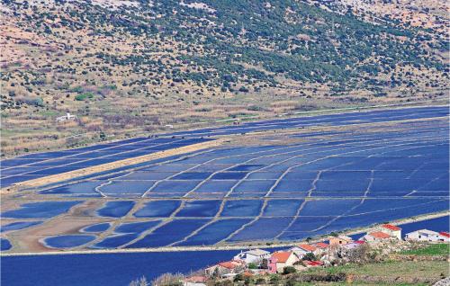 an aerial view of a large field of water at 3 Bedroom Nice Apartment In Miskovici in Miškovići