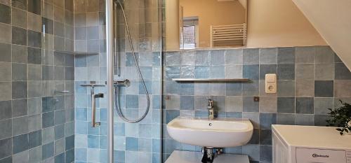 Ένα μπάνιο στο Ferienwohnung MH6