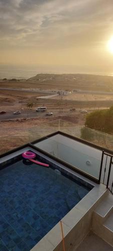 Πισίνα στο ή κοντά στο Villa vue mer TAMRAGHT avec piscine et terrasses 15 lits