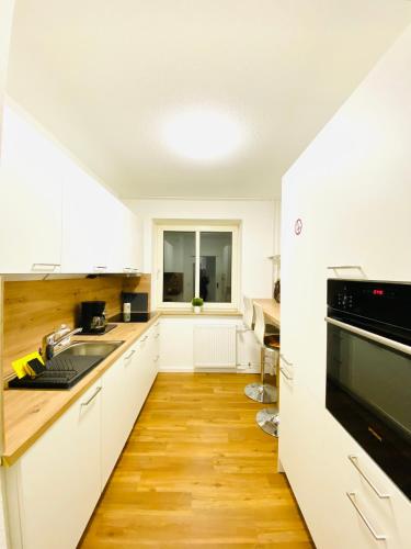 Foto WelcomeToMessePremium Three Bedroom Apartment 4