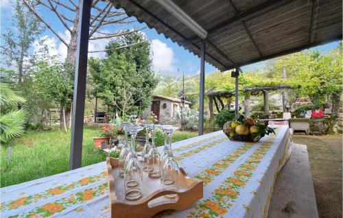 a table with glasses on top of a table at 3 Bedroom Nice Home In Campodimele in Campodimele