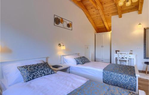 Ένα ή περισσότερα κρεβάτια σε δωμάτιο στο Villa Poji