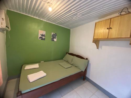Postel nebo postele na pokoji v ubytování Em's Homestay