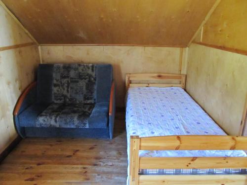 a bedroom with two beds in a room at Višķezers in Višķi