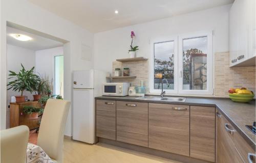 Dapur atau dapur kecil di Holiday Home Trget I