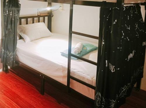 Postel nebo postele na pokoji v ubytování Chalok Hostel