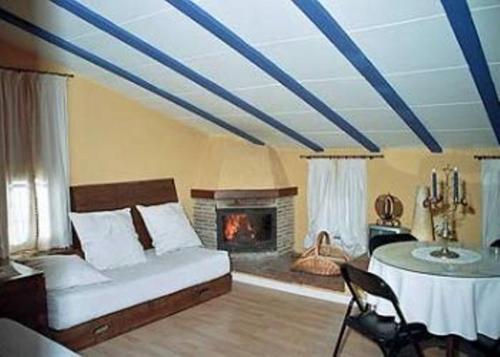 Postel nebo postele na pokoji v ubytování Casa Rural Jose Trullenque