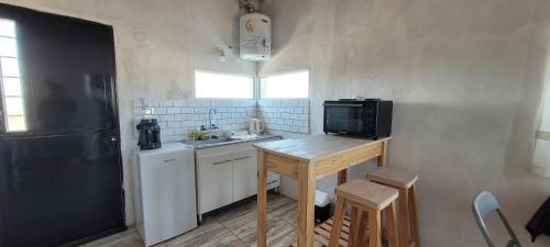 Η κουζίνα ή μικρή κουζίνα στο Aguara del Sol-Aguara Michi