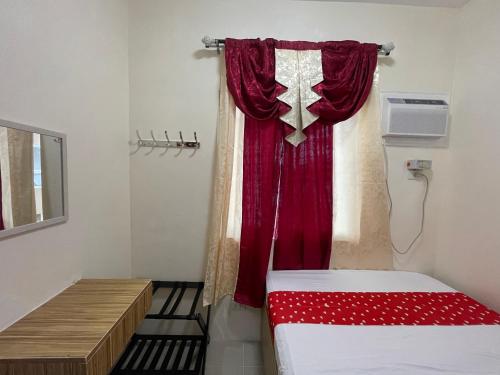 Postel nebo postele na pokoji v ubytování Staycation House in Dauis, Panglao