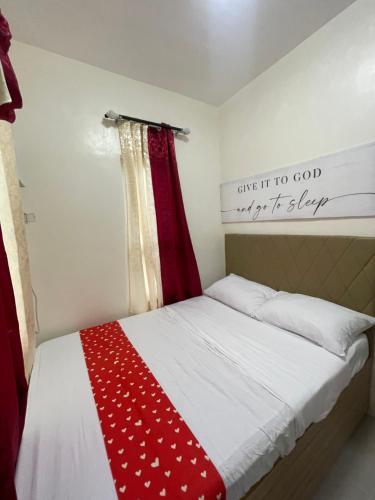 Postel nebo postele na pokoji v ubytování Staycation House in Dauis, Panglao