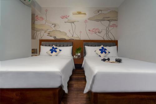 Ένα ή περισσότερα κρεβάτια σε δωμάτιο στο Delicate Hotel