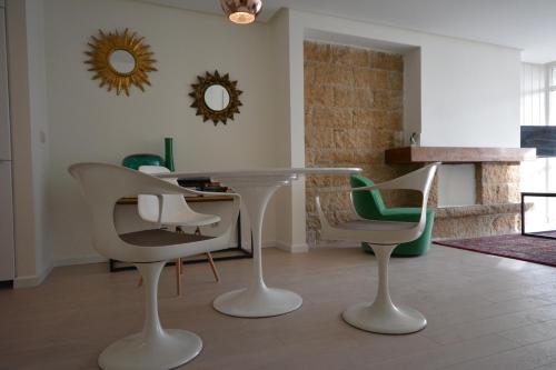 TV a/nebo společenská místnost v ubytování Nogalera Boutique Apartment
