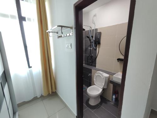 Un baño de Homestay Studio Apartment Bentara Suite, Kompleks Mutiara Gua Musang