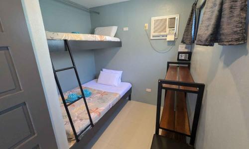 Voodi või voodid majutusasutuse Tipolo Guesthouse toas