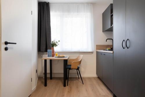 Η κουζίνα ή μικρή κουζίνα στο Central Bonn Apartments I private parking I home2share