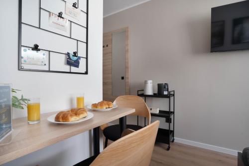 Μια τηλεόραση ή/και κέντρο ψυχαγωγίας στο Central Bonn Apartments I private parking I home2share