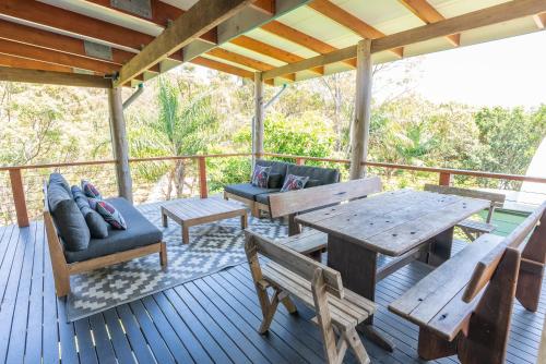Un lugar para sentarse en Tree & Sea sleeps 11