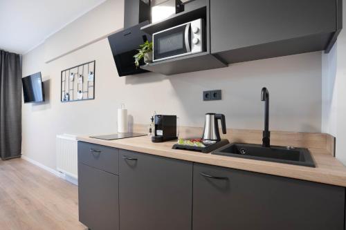 Η κουζίνα ή μικρή κουζίνα στο Central Bonn Apartments I private parking I home2share