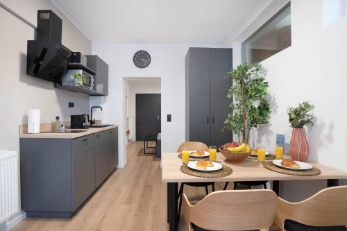 Η κουζίνα ή μικρή κουζίνα στο Central Bonn Apartments I private parking I home2share