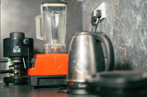 a blender sitting on top of a counter at Hostel Singha Lounge in Unawatuna